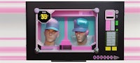 a pink vending machine with two heads on it