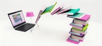 a stack of books next to a laptop and a lamp
