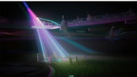 an image of a bridge with a colorful light beam