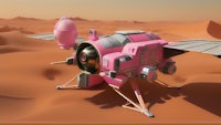 a pink spacecraft in the desert